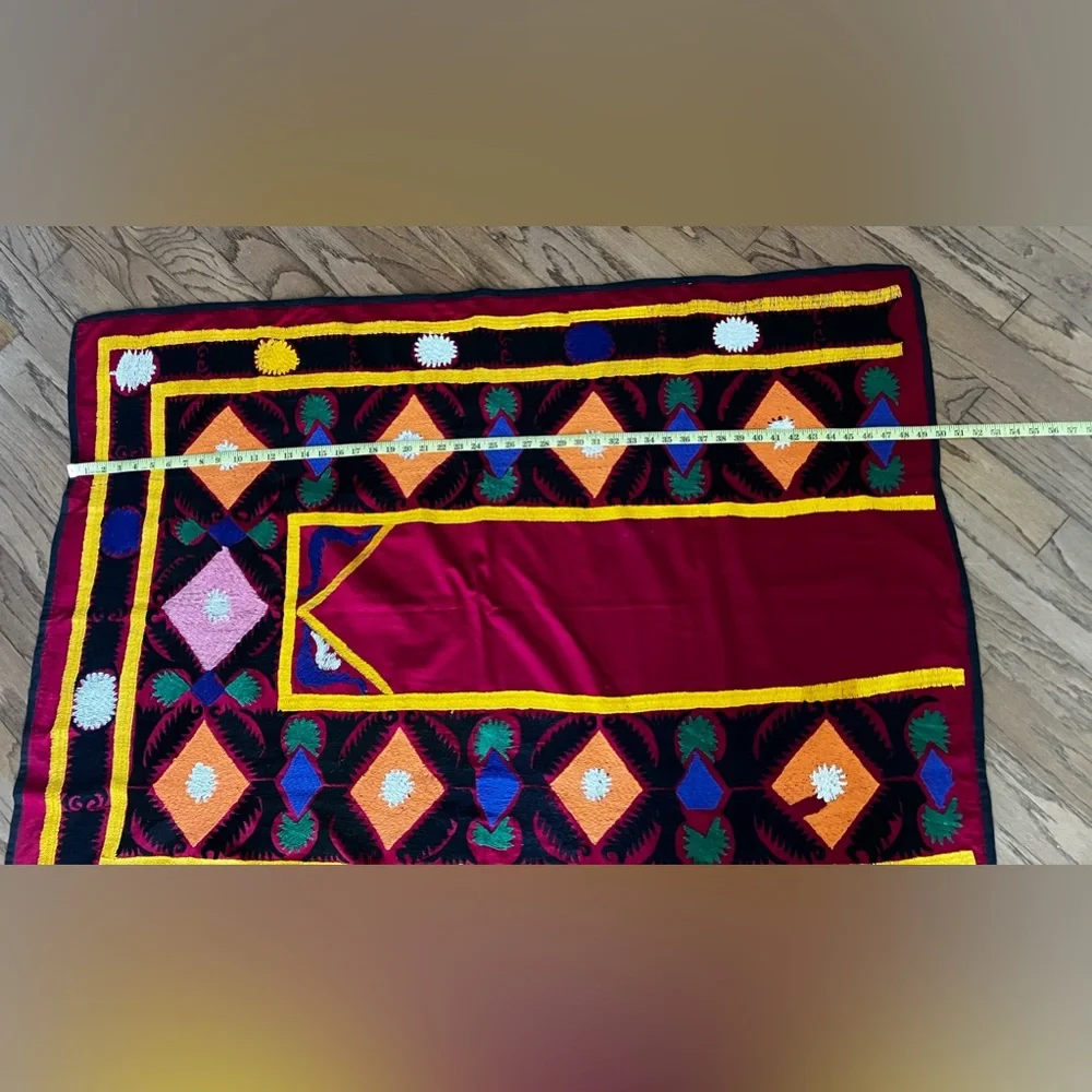 Suzane embroidered with cotton threads on cotton red fabric, hand made